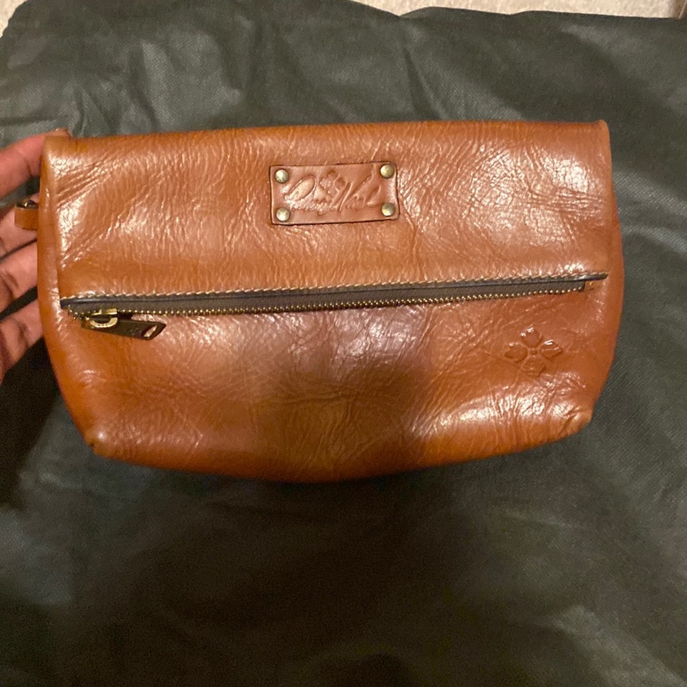 Foldable leather clutch